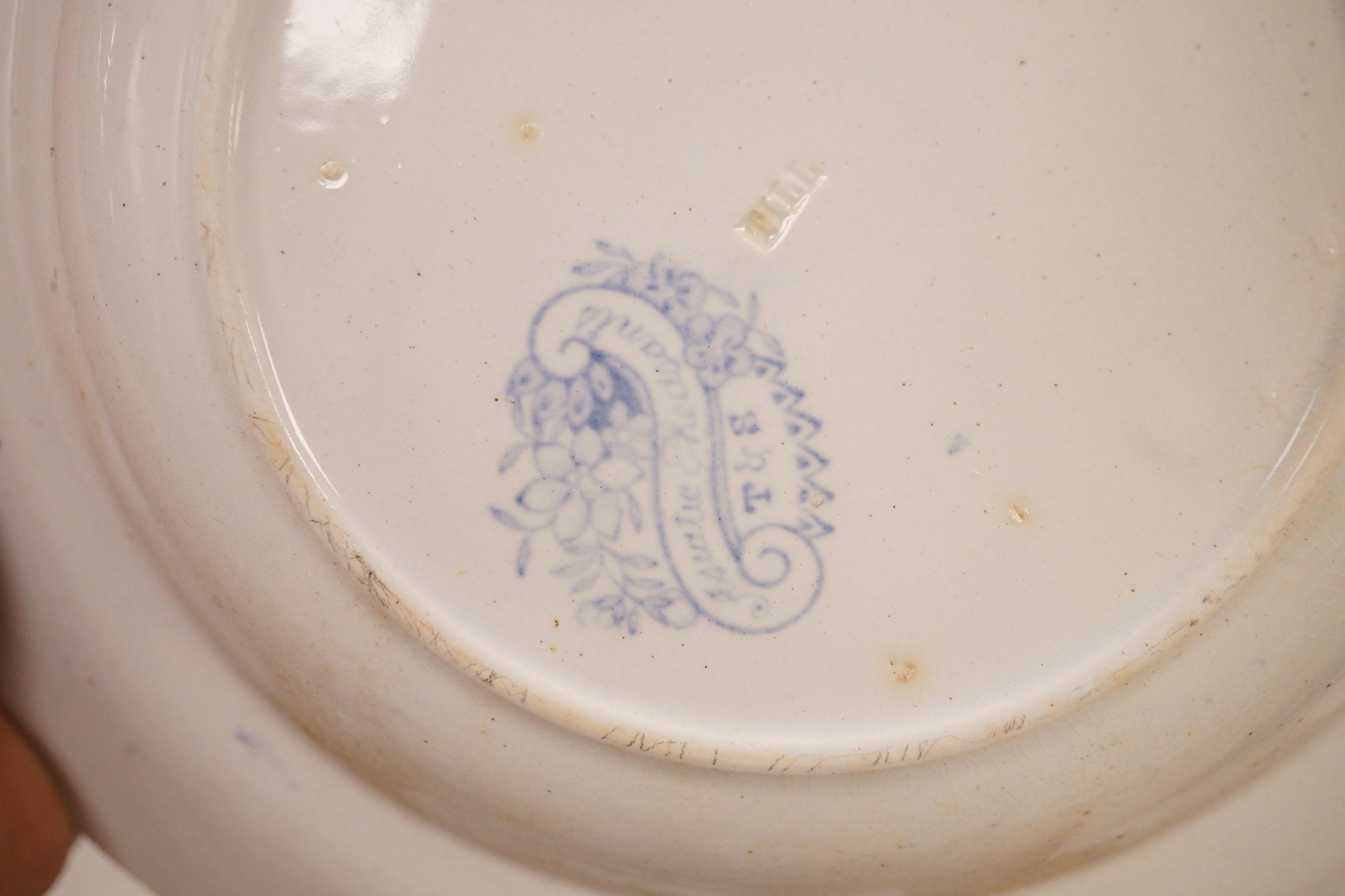 A collection of mostly 19th century blue and white transfer printed pottery tablewares